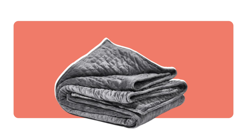 A gray weighted Gravity blanket folded into a square.