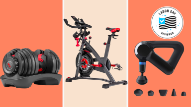Adjustable dumbbell, exercise bike, and massage gun on colorful background