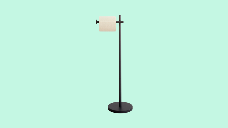 The West Elm Modern Overhang Bathroom Freestanding Toilet Paper Stand in front of a background.