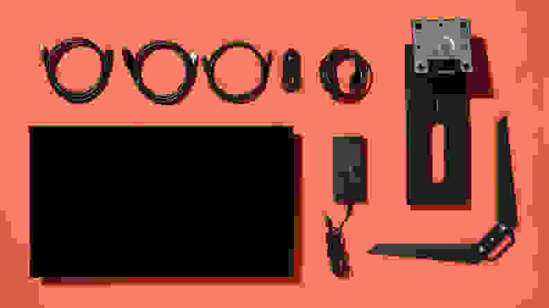 The contents of the Corsair Xeneon 27QHD240, including the monitor, stand and cables.