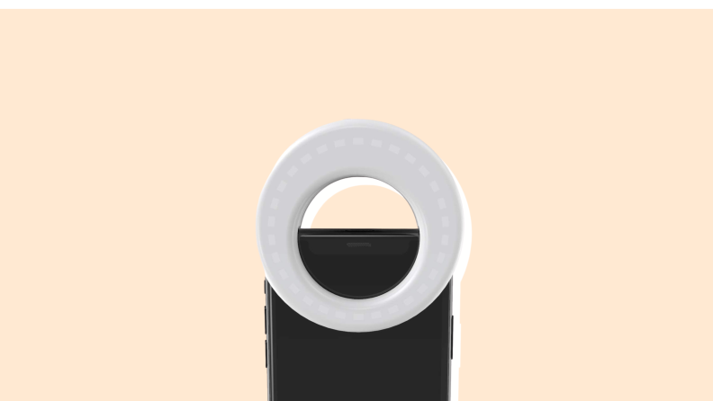 A Selfie Light Ring on a vanilla-colored background.