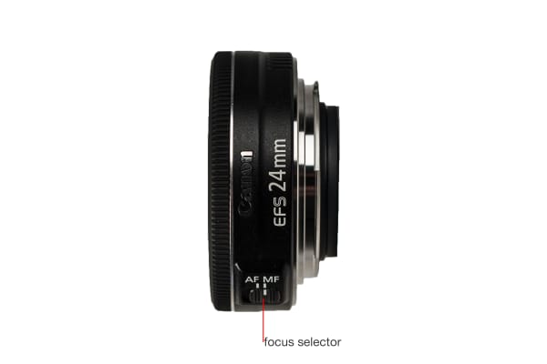 Side view of the Canon EF-S 24mm f/2.8 STM.