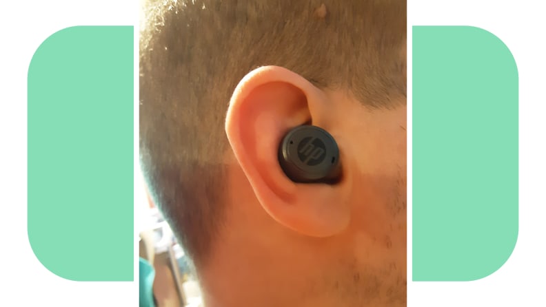 Person wearing the HP Hearing Pro OTC hearing aid in ear canal.