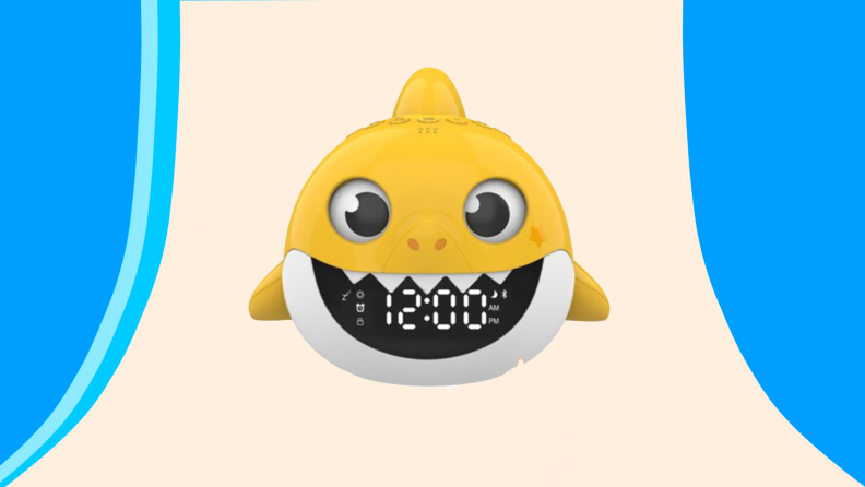 Yellow shark shaped alarm clock.