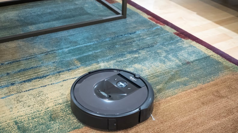 The iRobot Roomba i7+ cleaning a carpet