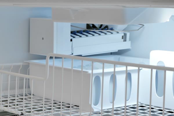 The Whirlpool WRF535SMBM's ice maker is stuck down the freezer, with just a flip wire to turn it on or off.