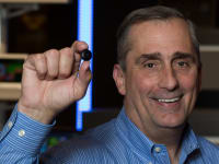 Intel CEO Brain Krzanich holding the Intel Curie