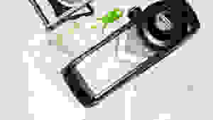 Different mandoline slicers are lined up in a diagonal line