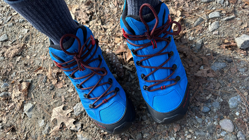 Close-up photograph of blue hiking boots.
