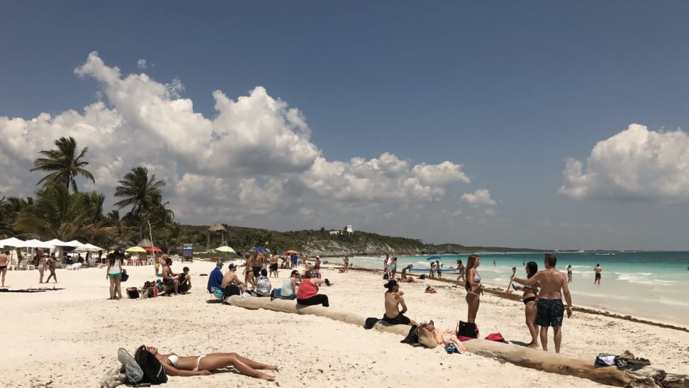 Tourists enjoy a beach along the Mexican Riviera.