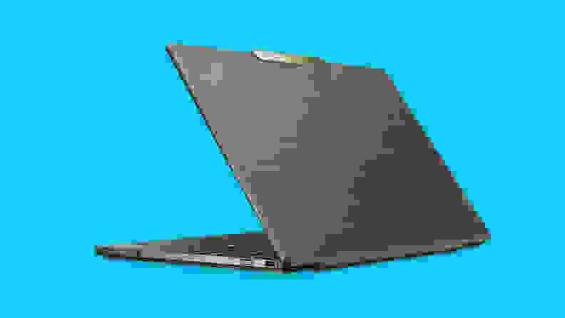 A Lenovo business laptop partially unfolded on a blue background.