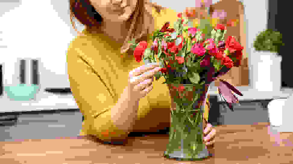 Putting flowers in a vase