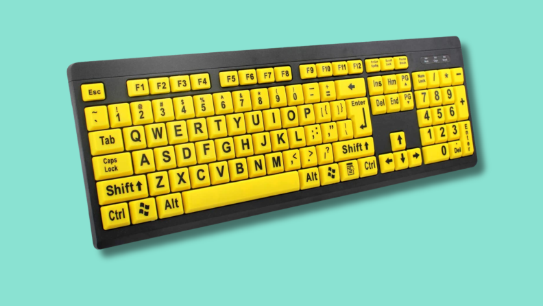 The BOOGIIO Large Print High Contrast Keyboard on a green background.