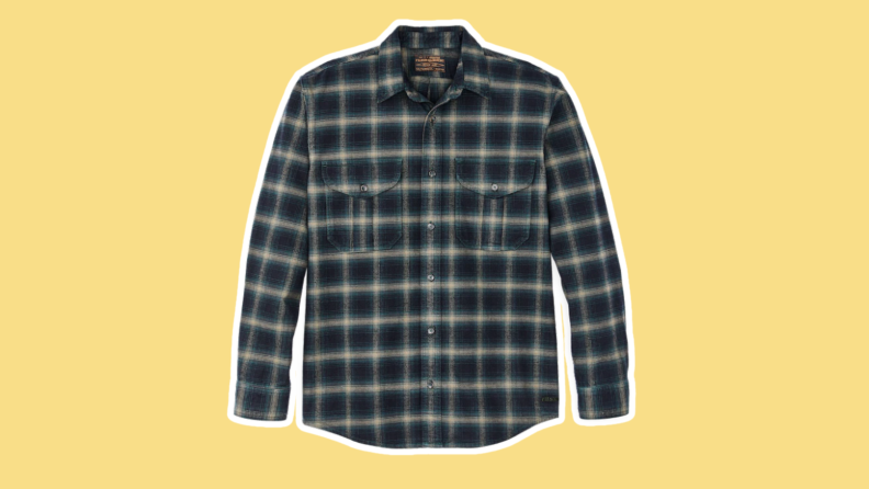 The Alaskan Guide Shirt in the colors, navy, pine bronze plaid.