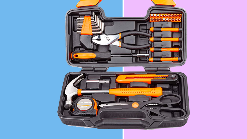 An image of an orange toolkit with several different tools including a wrench, Allen keys, a tape measure, a screwdriver, a hammer, and more.