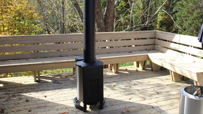 The Solo Stove Patio Heater assembled on a wooden deck.