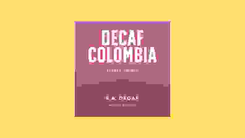 A decaf coffee label against a bright yellow background.