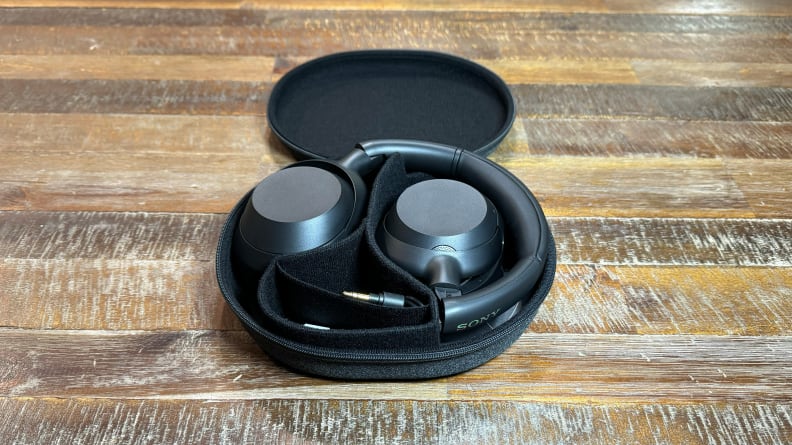 The Sony Ult Wear headphones folded up in their carrying case.