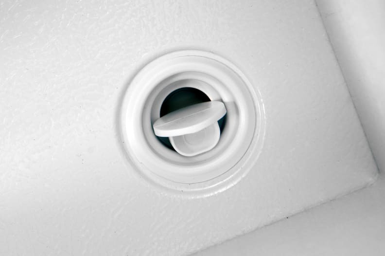 Make sure that the Frigidaire Gallery FGCH25M8LW's cap on the small interior drain—located in the front right corner—is inserted with the grip facing up.