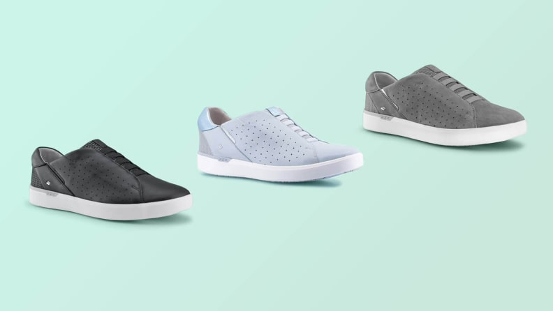 Three Kizik shoes on light green background