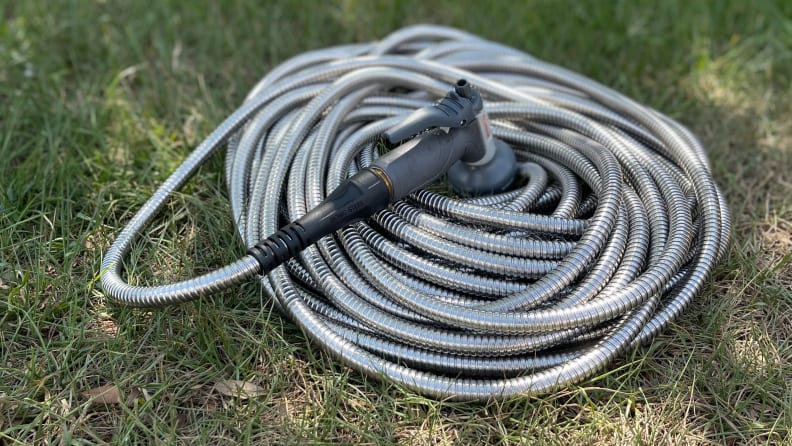 The Bionic Steel Garden Hose in the grass