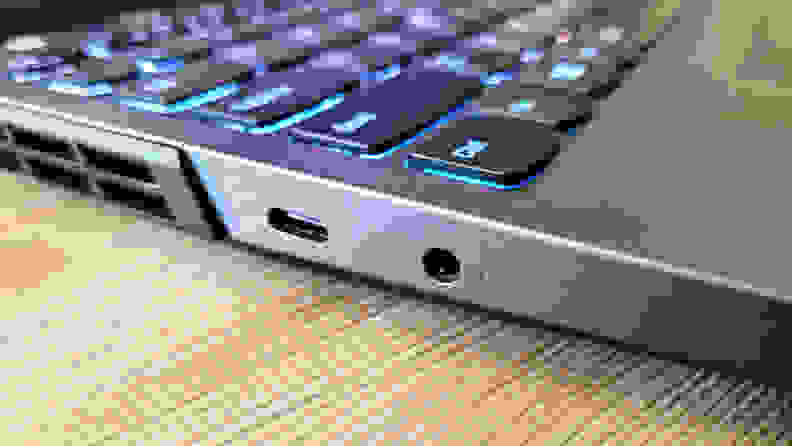Close up view of side ports on a laptop.