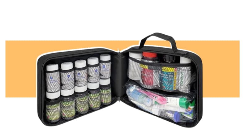 A StarPlus2 Padded Medicine Bag with a variety of pill bottles inside.