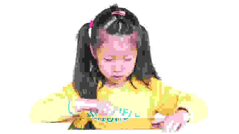 Young girl learning in a tablet