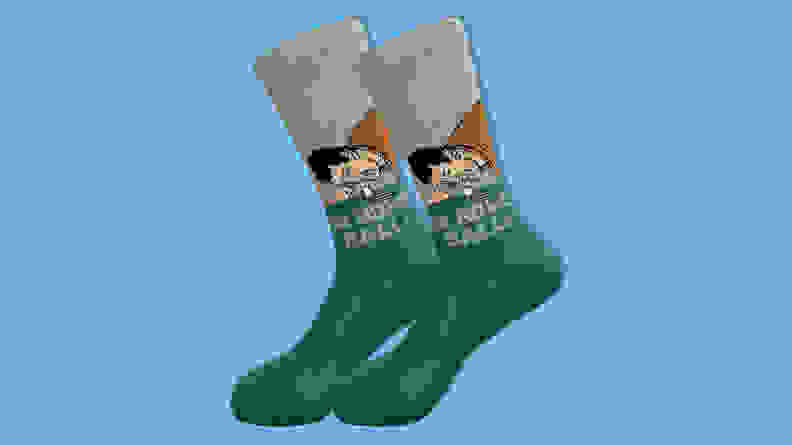 Balanced Co. “Happy Gilmore” socks on a blue background.