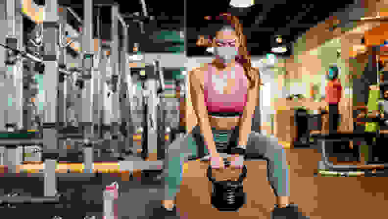 woman wearing a mask in a gym