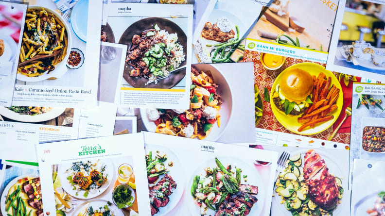 A spread of meal kit cards from different services.
