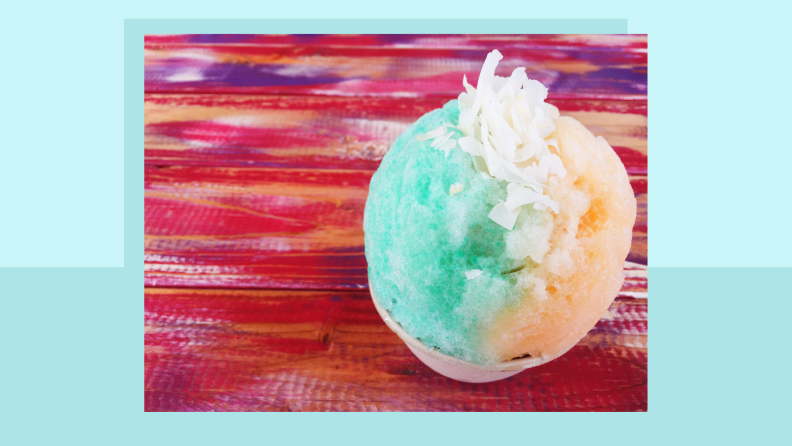 Close up of a shave ice with coconut topping.