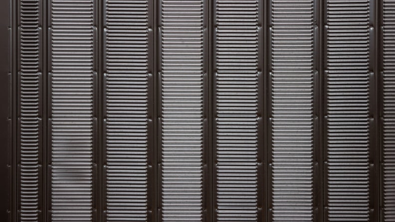 The coils that line the back of an average refrigerator.