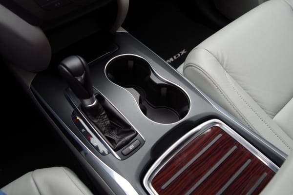 The 2014 Acura MDX comes with two cupholders and a cavernous center storage console.