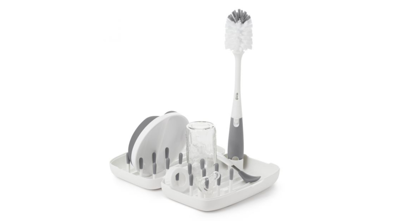 OXO Tot portable drying rack with brush.