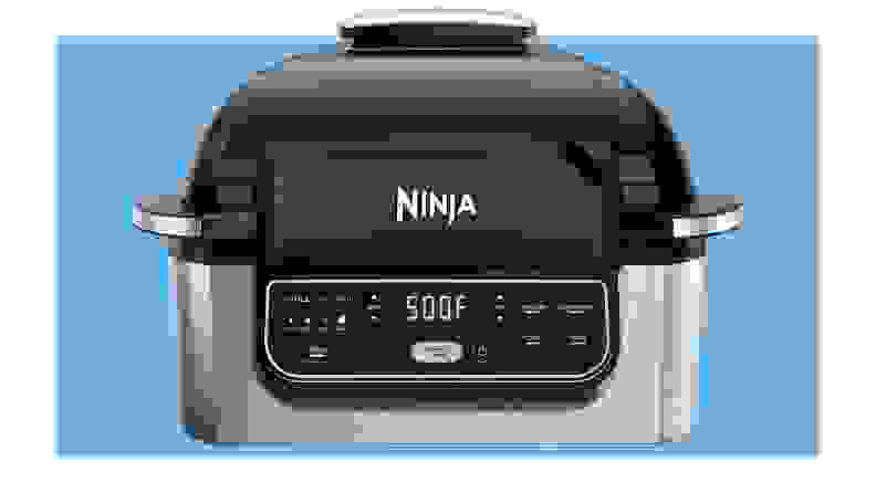 The Ninja Foodi Grill in front of a background.