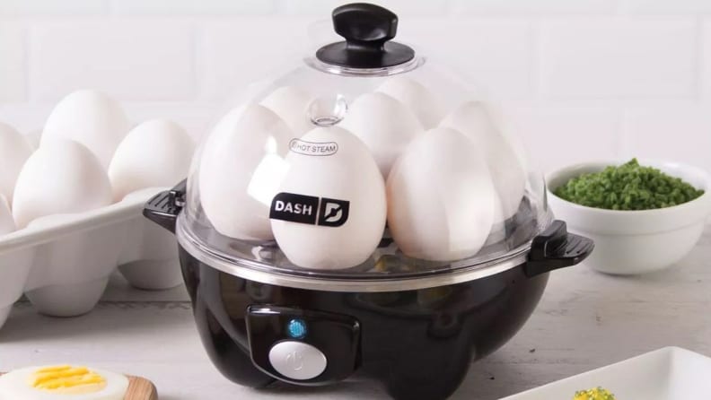 A Dash rapid egg cooker making a half dozen boiled eggs.