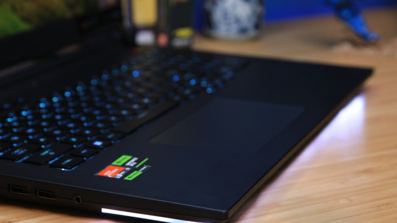 Close-up angled view of the keyboard and trackpad on the Asus ROG Strix SCAR 17 gaming laptop.