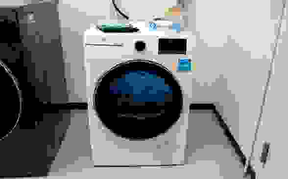 A white ventless dryer sits next to a larger dryer in the Reviewed lab.