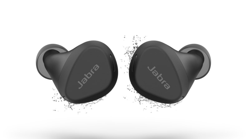 A pair of sporty, all-black earbuds sit on a white background
