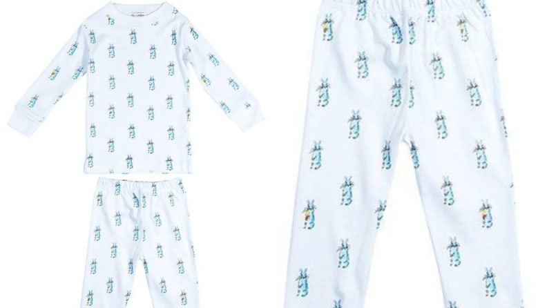 Hand-painted tiny blue bunnies on a set of white pajamas.