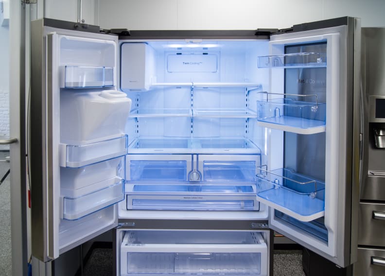 The interior layout of the Samsung RF28HDEDBSR's main fridge compartment is quite familiar.