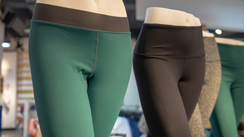 Spandex yoga pants on mannequins in a store.