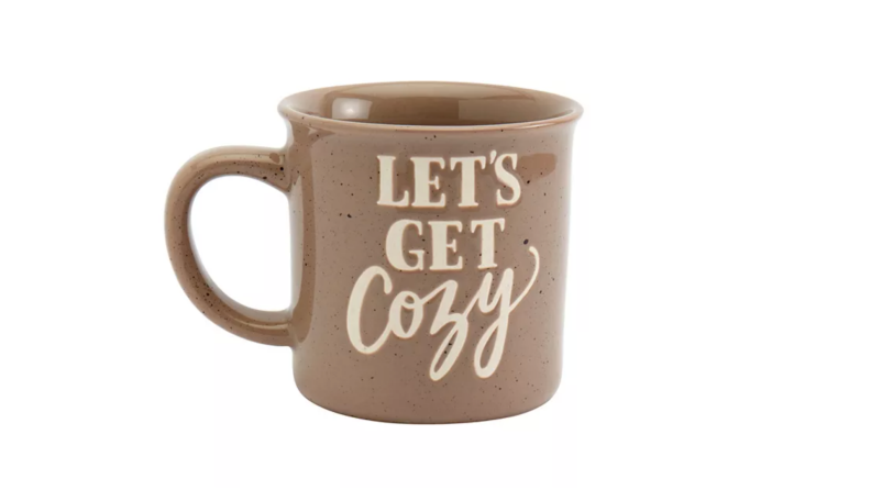 A brown mug that readers 'Let's Get Cozy'