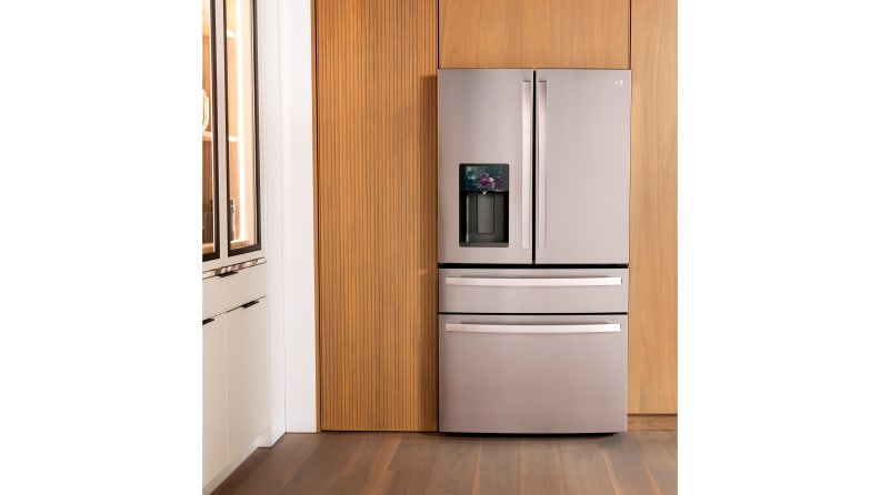 The GE Profile Smart 4-door refrigerator in a beautiful kitchen