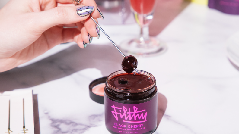 cocktail cherries in purple jar