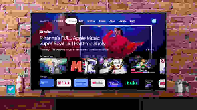 The Sony X90K LED TV home screen featuring a picture of Rhianna singing and smart apps, such as, Netflix, YouTube, Amazon, Hulu, and Disney Plus.