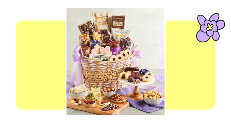 A Harry & David gift basket filled with cookies, crackers, popcorn, pretzels and more.