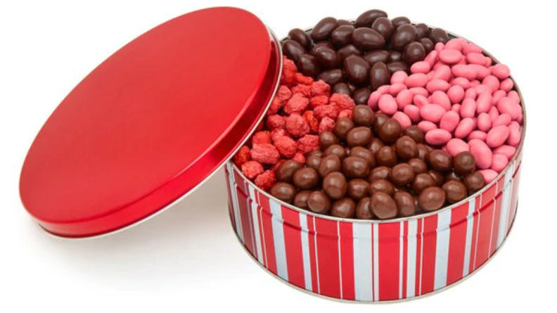 Chocolate-covered nuts in container