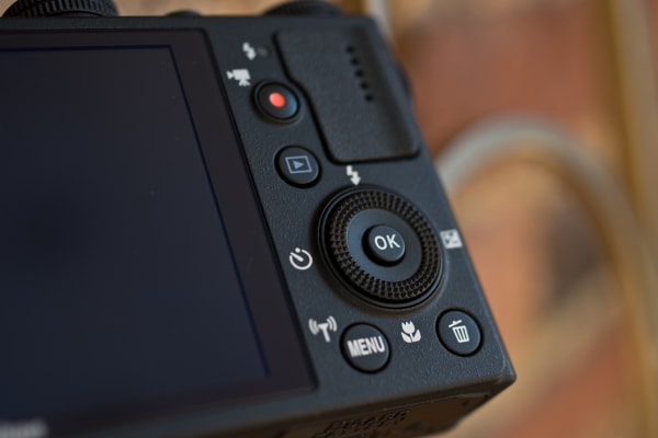 A photograph of the Nikon Coolpix P340's rear controls.